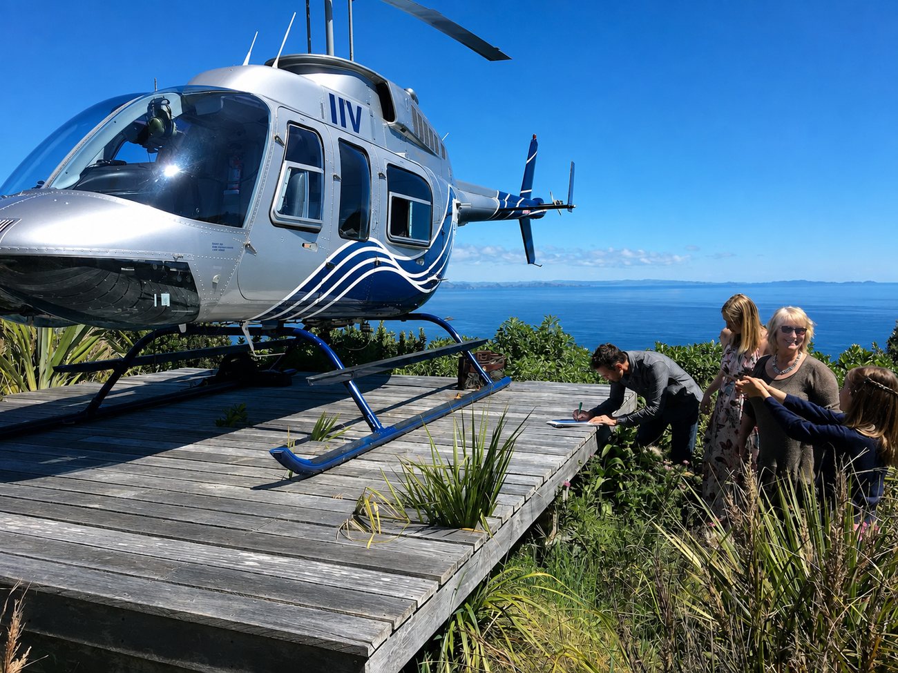 A helicopter landed on a coastal deck with the party stepping out above the sea